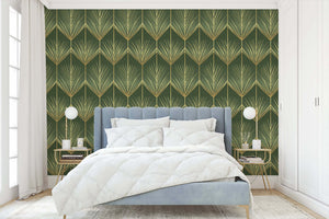 Luxurious bedroom with Golden Fronds Art Deco wallpaper featuring gold palm fronds, showcasing vintage design and tropical elegance.