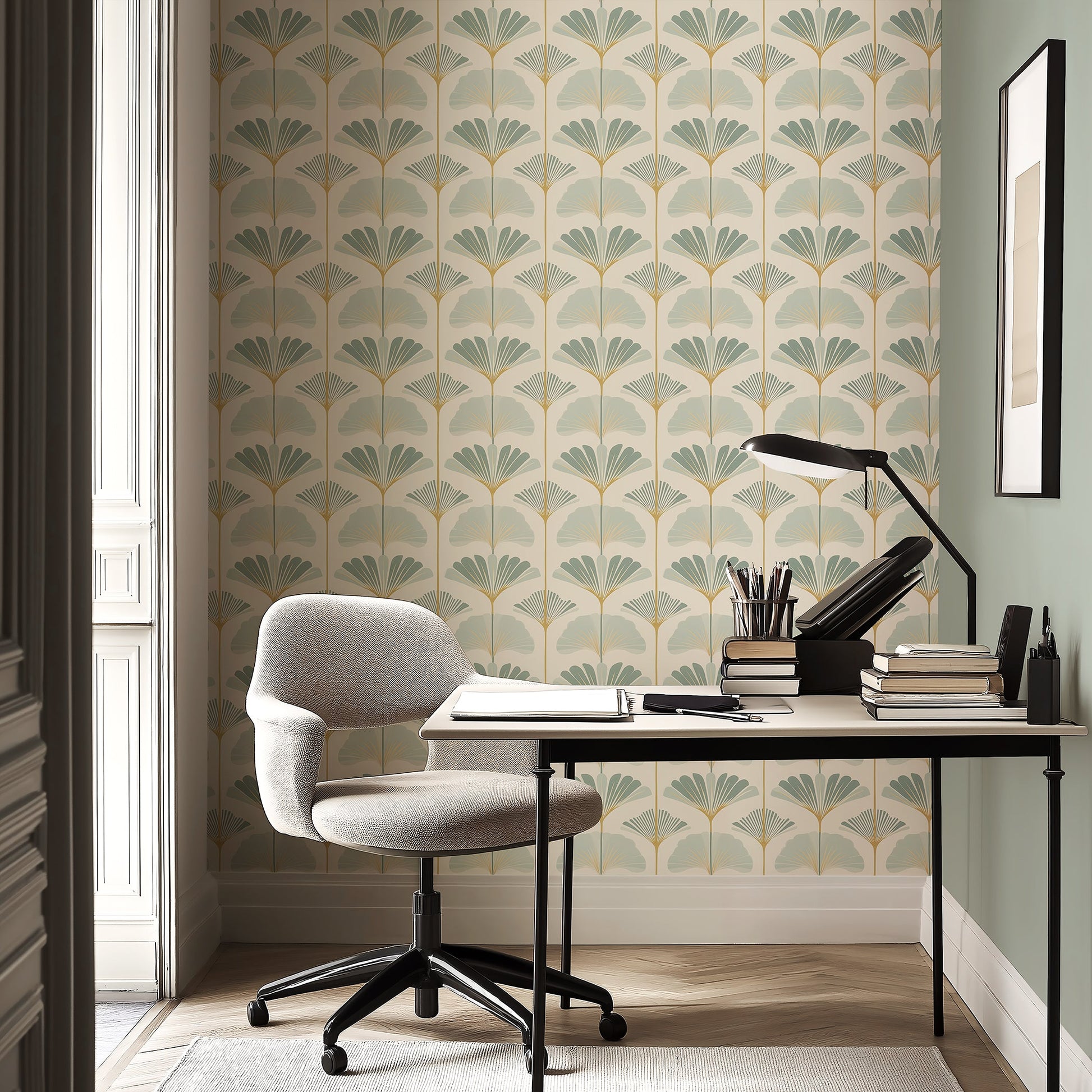 Modern Ginkgo Harmony wallpaper in sage and gold tones, featuring a floral pattern, enhances a home office with coastal elegance.