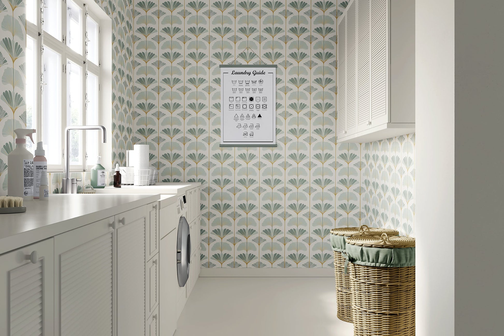 Ginkgo Harmony wallpaper in a modern laundry room, featuring coastal floral design with ginkgo flowers in sage and gold tones.