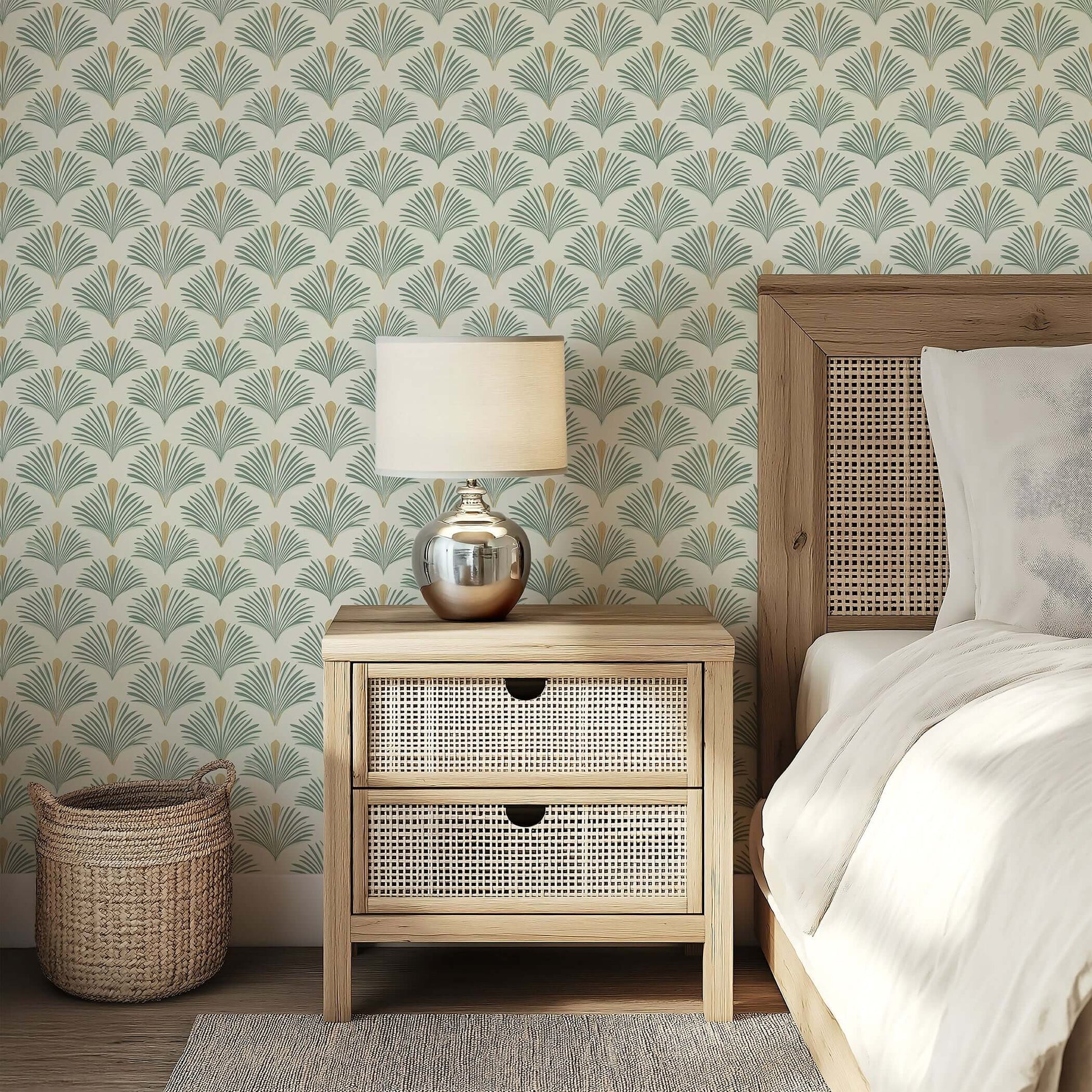 Coastal wallpaper with sage green palm fronds and golden accents, complementing natural wood furniture in a modern bedroom setting.