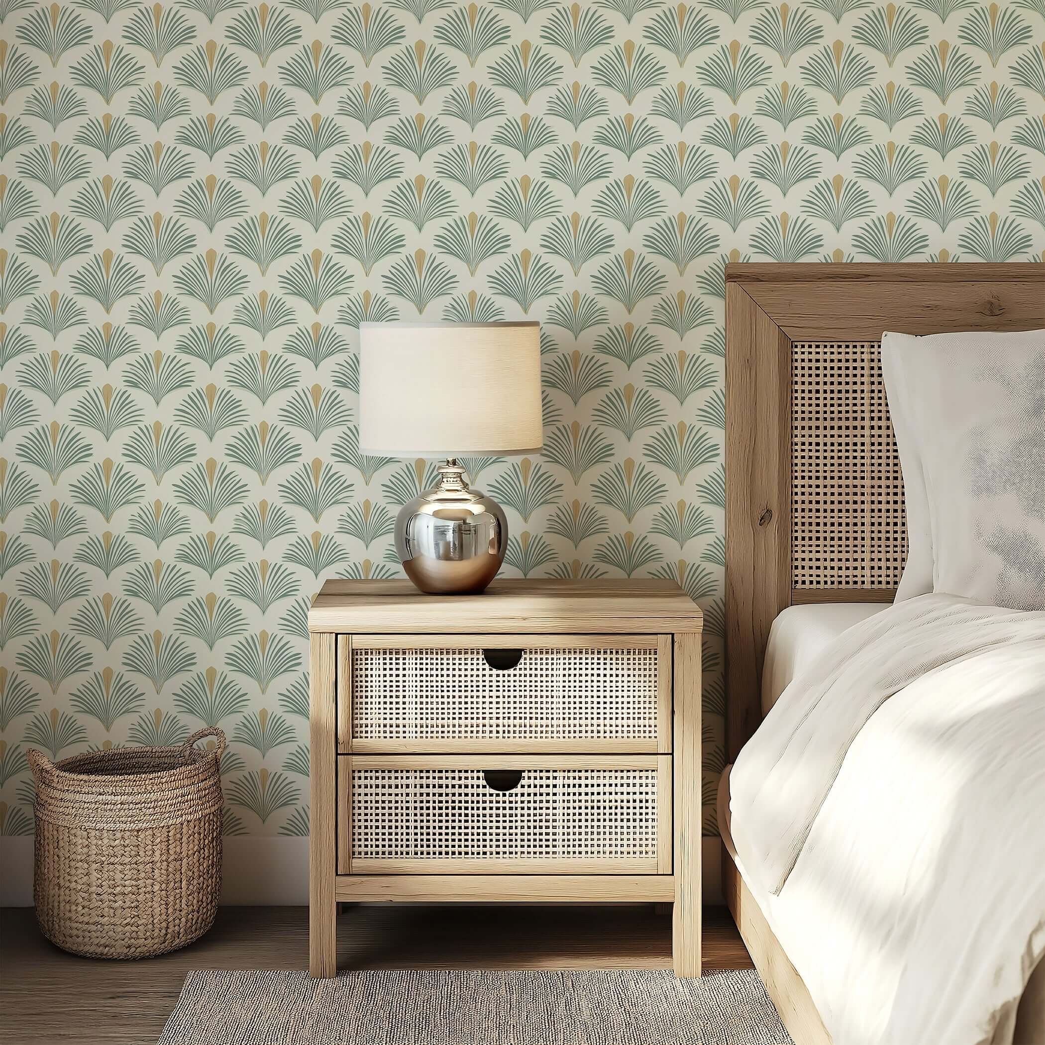 Coastal wallpaper with sage green palm fronds and golden accents, complementing natural wood furniture in a modern bedroom setting.