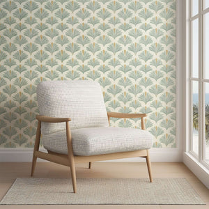 Palmetto Oasis Wallpaper with sage green palm fronds, modern coastal design, complements wood and rattan decor in a serene room.
