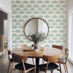 Dining room with Ethereal Palm wallpaper featuring modern palm design in soft sage and muted gold, enhancing a coastal aesthetic.