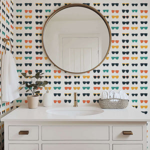Mid-century modern pop art wallpaper with colorful sunglasses pattern, perfect for coastal walls and creative spaces.