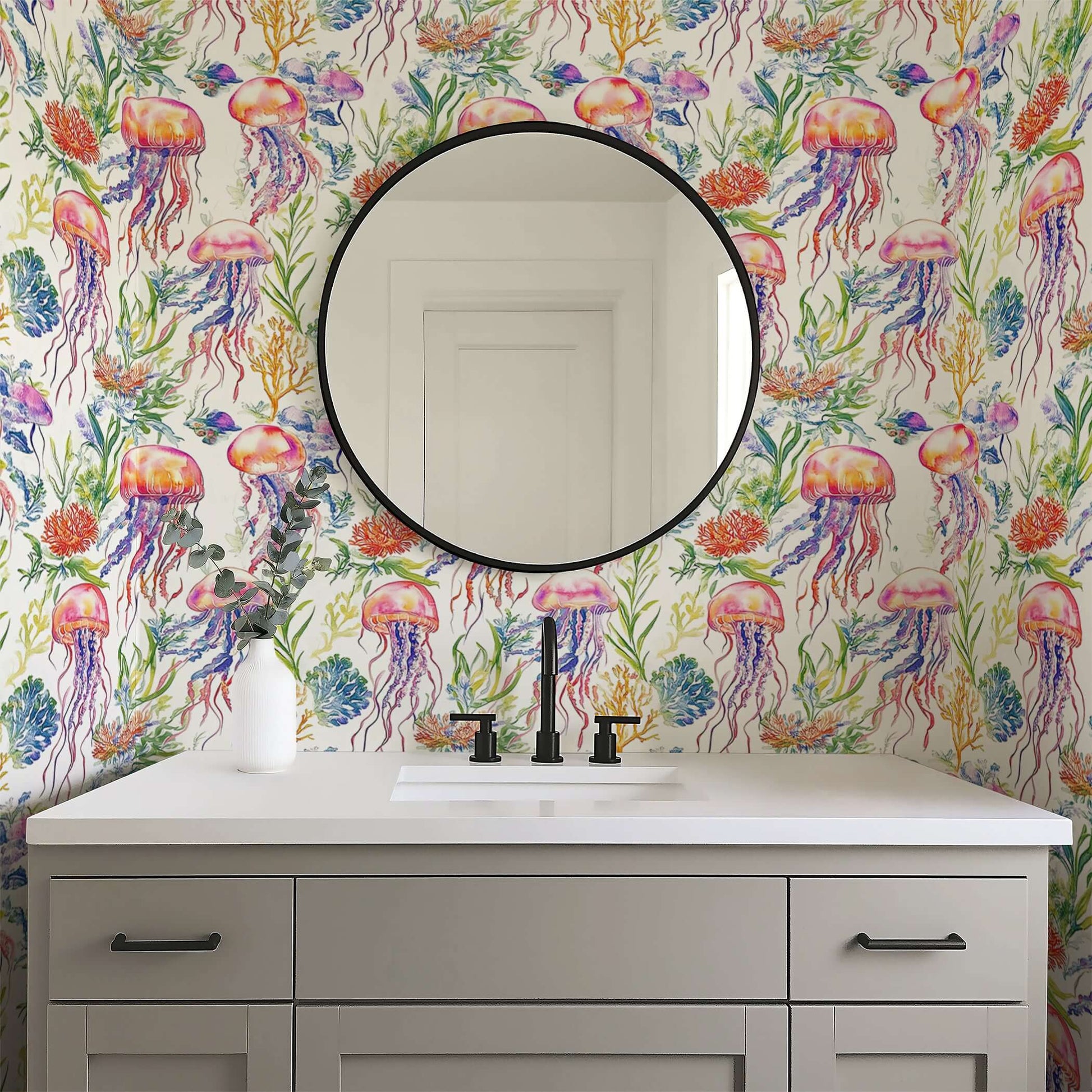 Undersea Watercolor Bliss wallpaper with hand-painted jellyfish and seaweed, creating a vibrant coastal ambiance in a bathroom setting.
