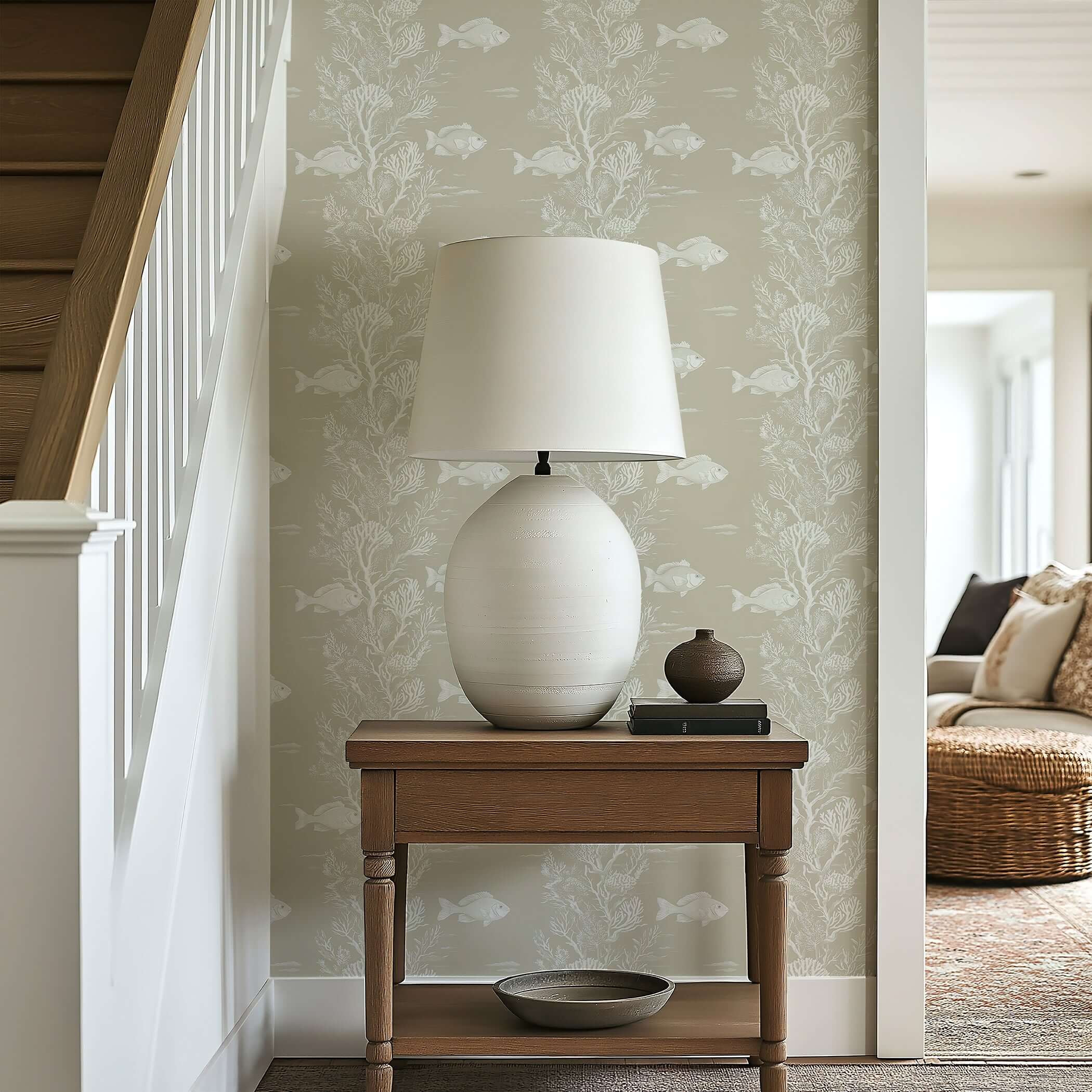 Coastal corner featuring Reef Dreams wallpaper with fish and coral, creating an ocean-themed, serene ambiance with a soft color palette.