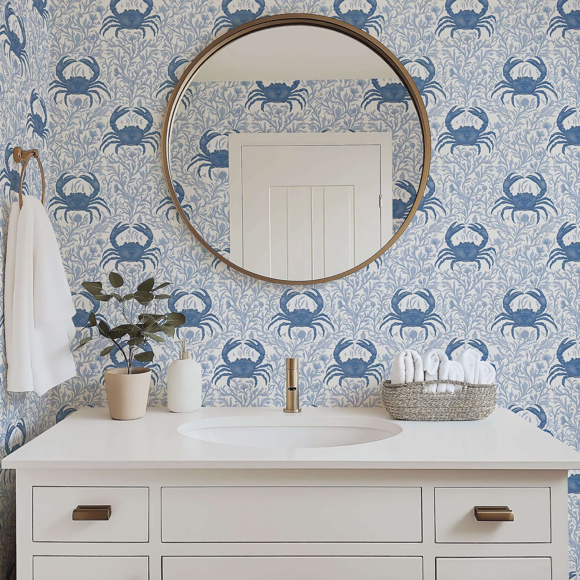 Elegant bathroom with Blue Crab Botanica wallpaper featuring coastal marine design and botanical ocean elements.