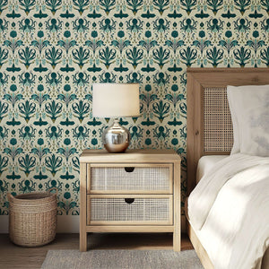 Mystic Ocean Damask wallpaper in a bedroom, featuring marine patterns with octopus, sting rays, and coastal charm in green and teal.