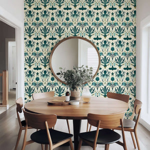 Dining room with Mystic Ocean Damask wallpaper featuring octopus and marine motifs in coastal green and teal hues.