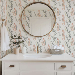 Seahorse Serenity Wallpaper in a bathroom setting with hand-drawn coral, peach seahorses, and ocean-inspired design enhancing coastal decor.