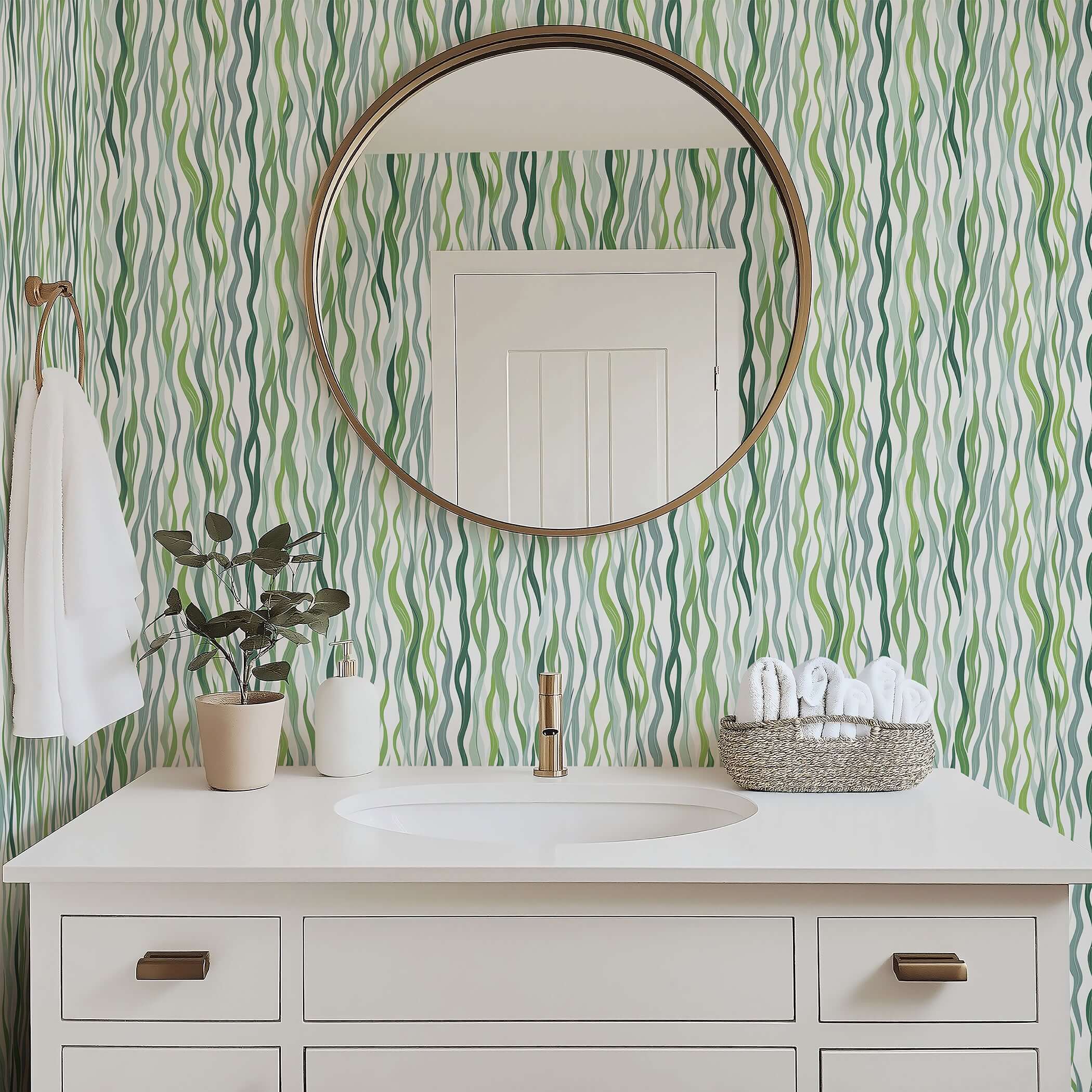 Luxurious bathroom with Kelp Cascade coastal wallpaper, featuring flowing green kelp strands, complements serene spa-like décor.