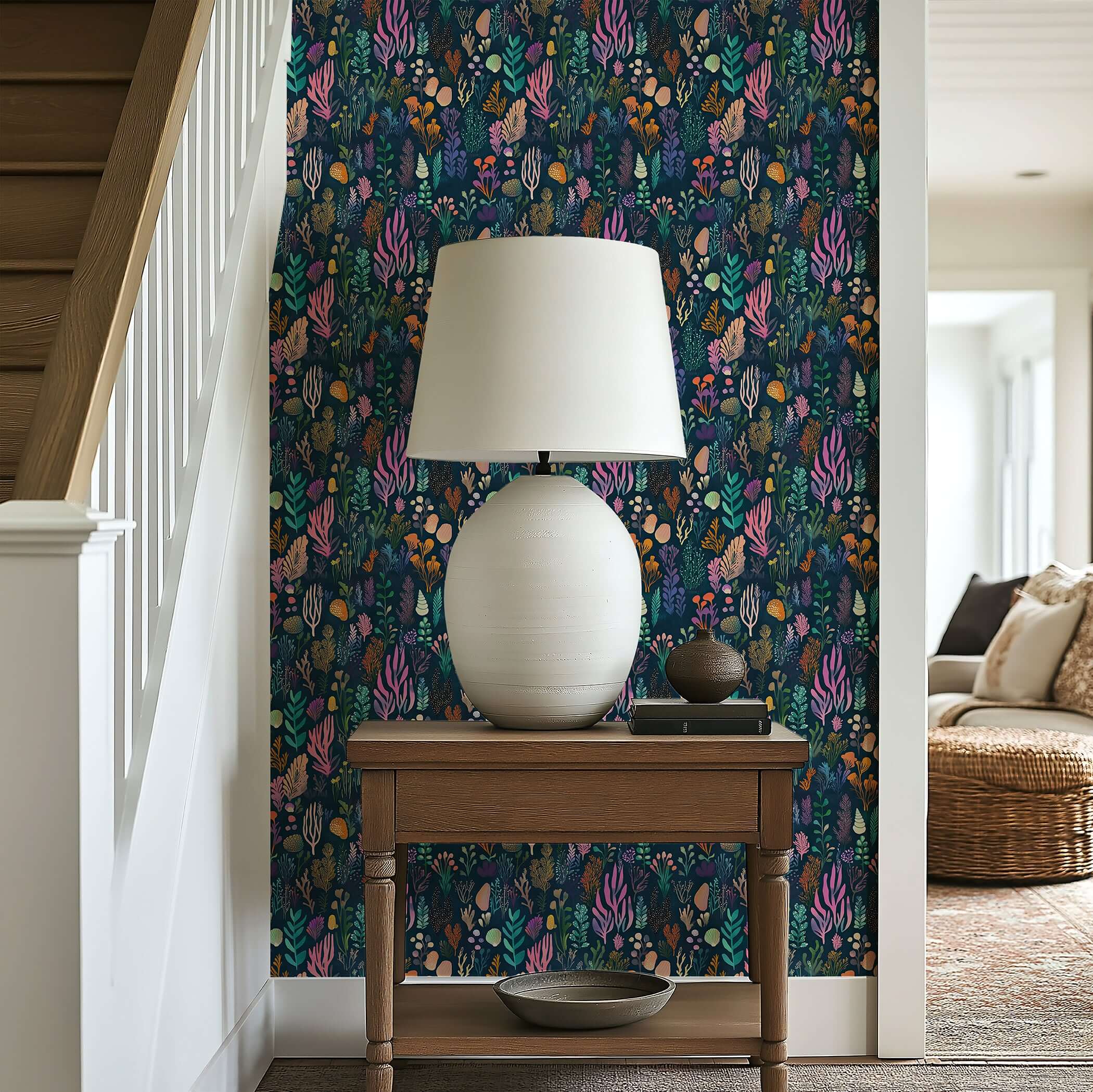 Enchanted Ocean Flora wallpaper featuring vivid ocean plants in violet, coral, emerald, and gold on a navy backdrop.