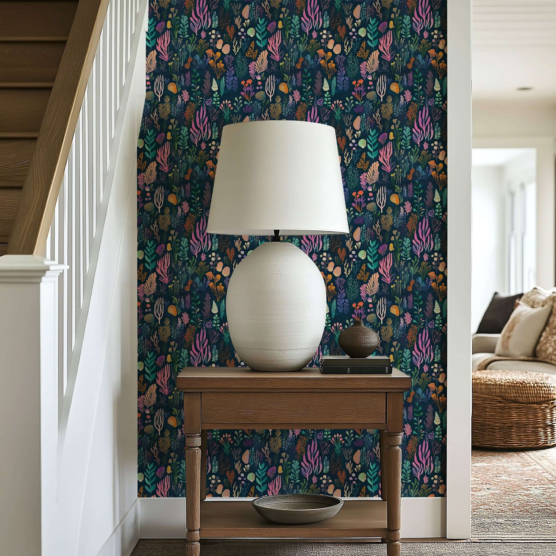 Enchanted Ocean Flora wallpaper featuring vivid ocean plants in violet, coral, emerald, and gold on a navy backdrop.