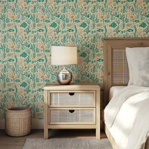 Mid-century modern bedroom with Coral Reef Chronicles wallpaper, featuring fish and seaweed in teal and sandy tones for a coastal feel.
