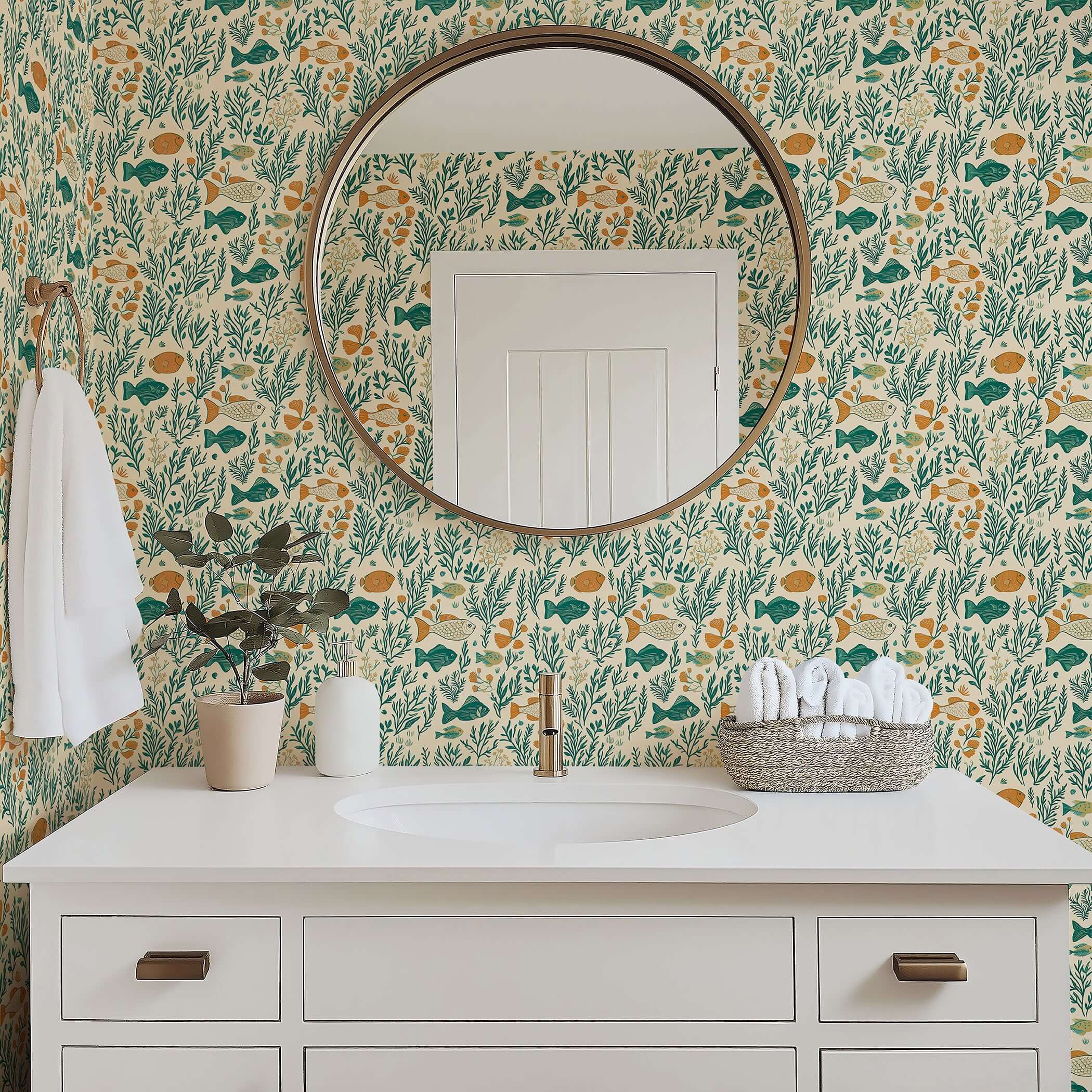 Bathroom with Sea Garden Bliss wallpaper featuring fish, coral, and seaweed in teal and green, creating a coastal mid-century modern vibe.