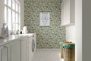 Laundry room with Sea Garden Bliss wallpaper featuring fish, coral, and seaweed in a mid-century modern coastal design.