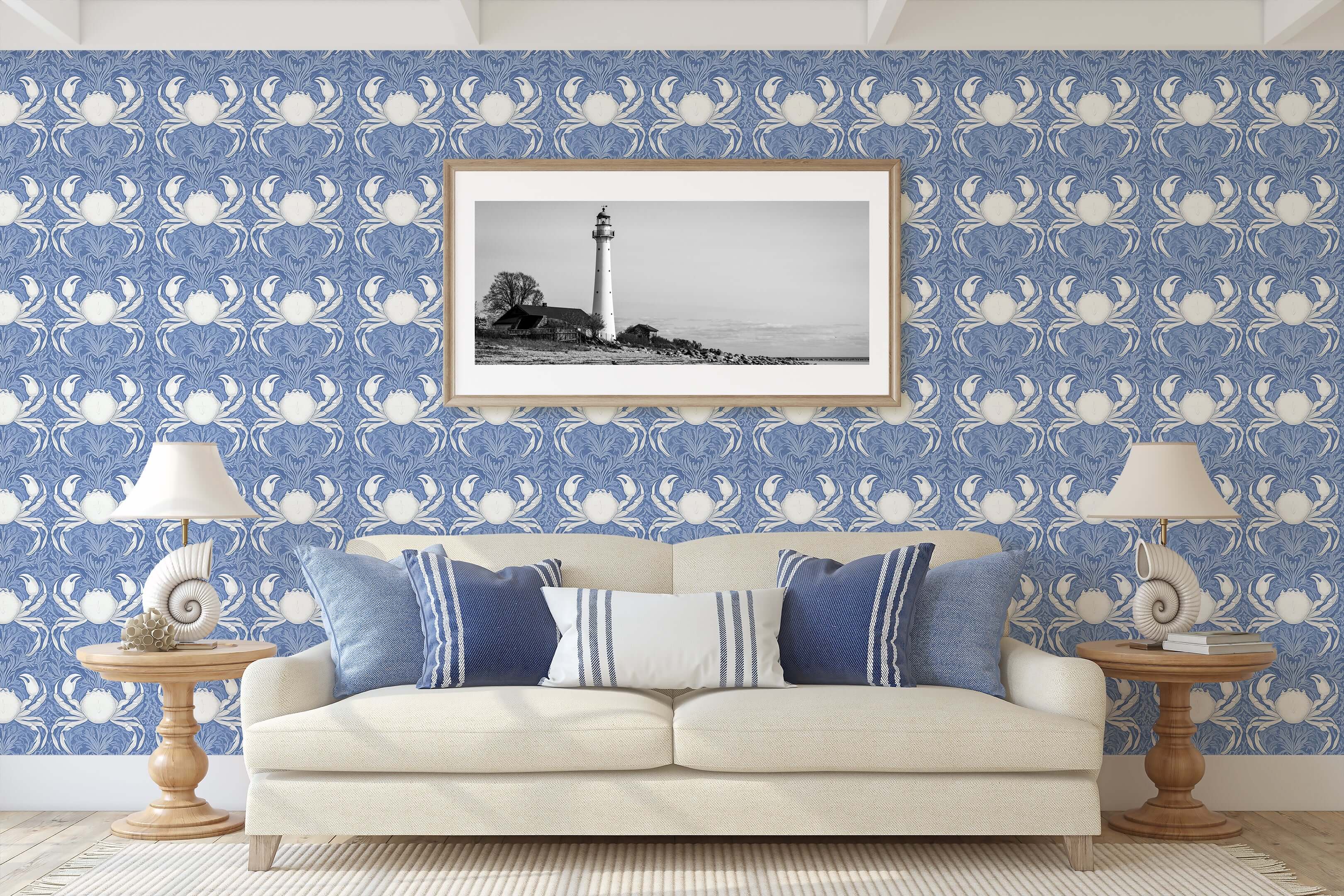Nautical themed room with Coastal Aristocrat wallpaper featuring crabs and sea foliage in a damask design on a blue backdrop.