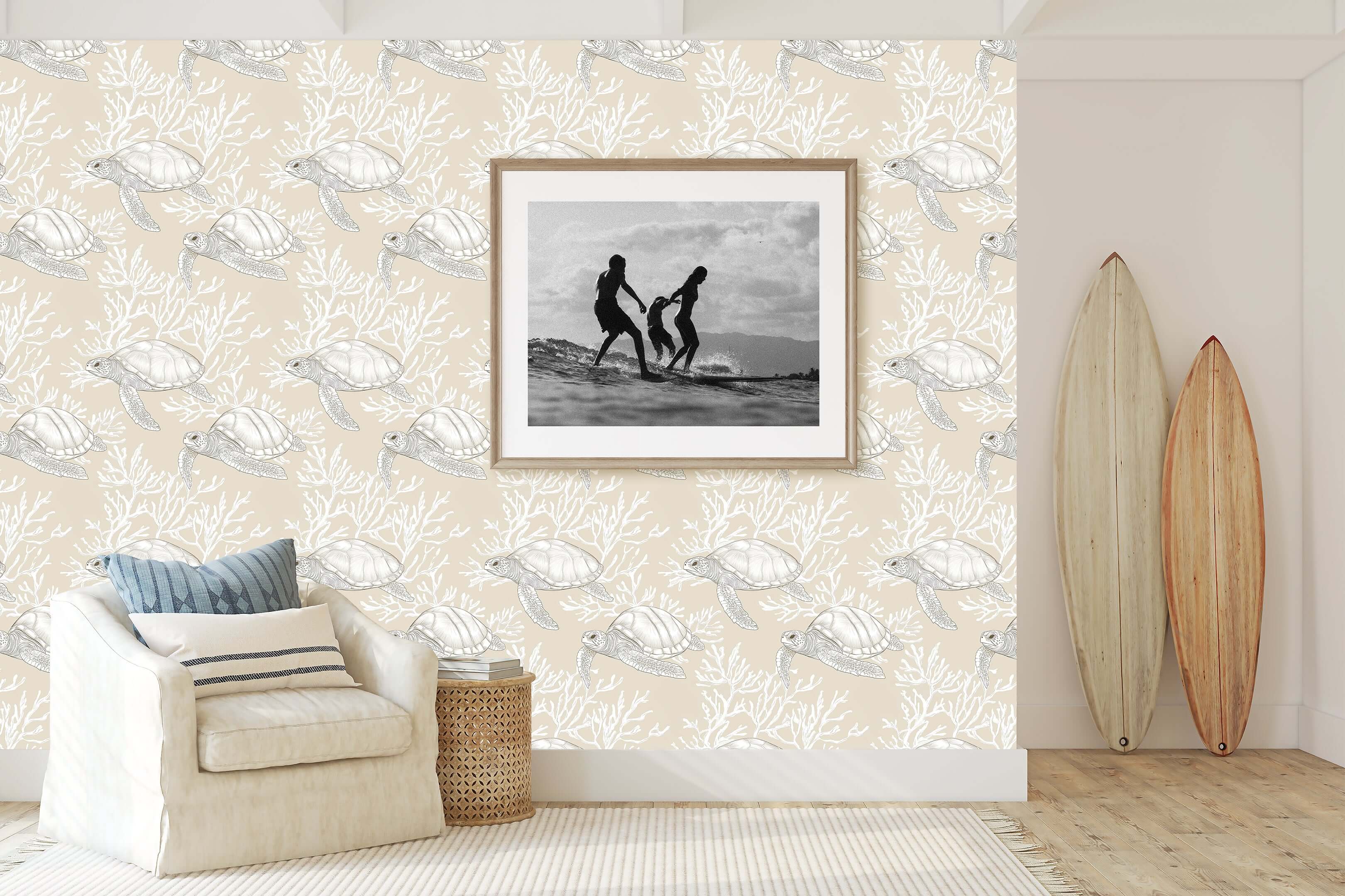 Coastal wallpaper with hand-drawn turtles and coral on a sand backdrop, enhancing a beach-themed living space decor.