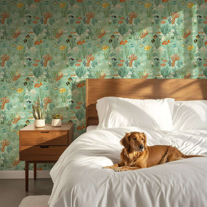 Coastal wallpaper featuring ocean fish, coral, and seaweed with a dog resting on a bed; ideal for tranquility and aesthetic charm.