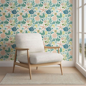 Serene Tidepool Treasures coastal wallpaper with coral, seaweed, and fish pattern, creating a tranquil ocean-inspired room ambiance.