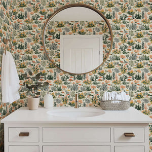 Modern bathroom with Tropical Tide coastal wallpaper featuring coral reefs, tropical fish, and sea plants in soothing greens and corals.