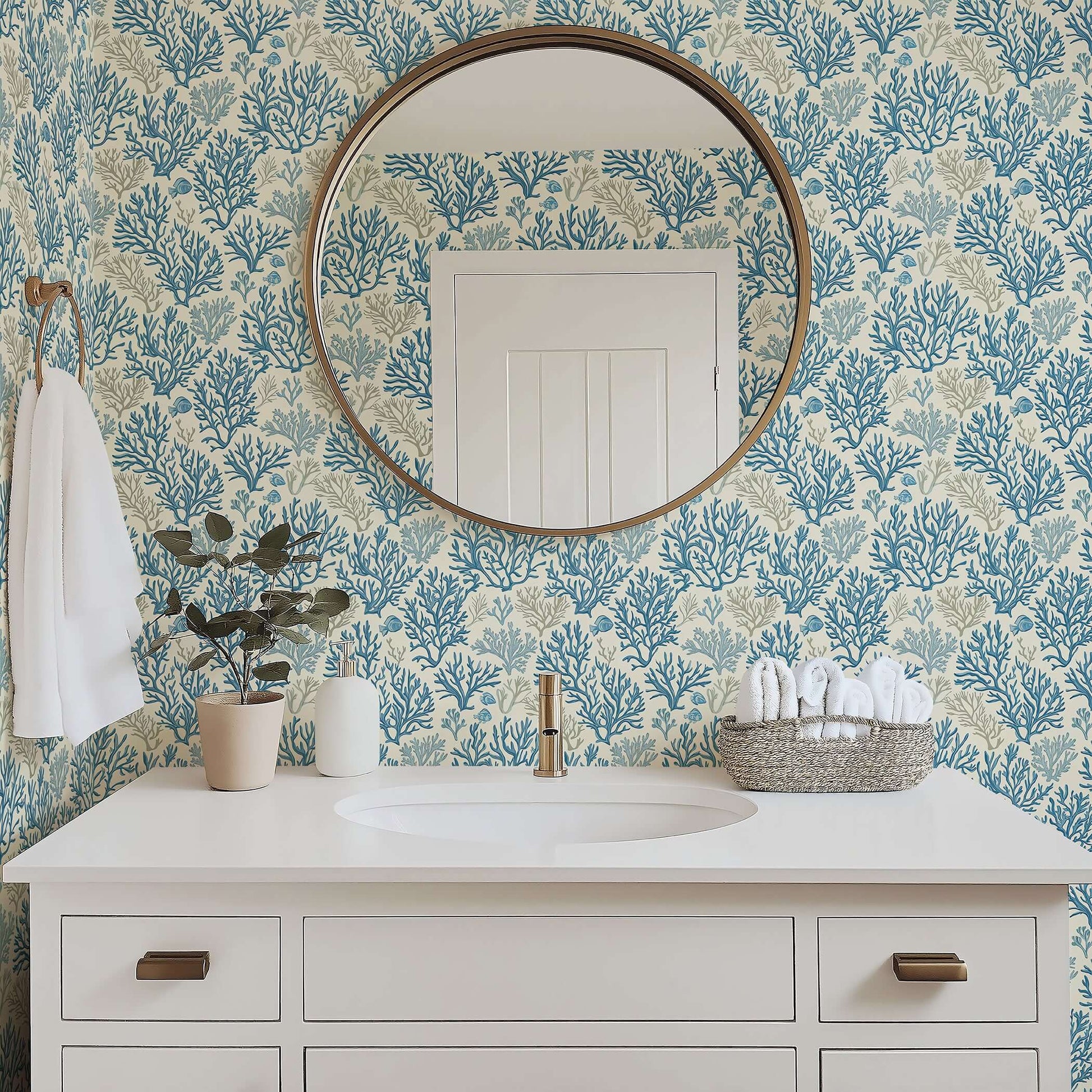 Elegant bathroom with Blue Coral Reef coastal wallpaper featuring hand-drawn coral branches, enhancing the beach-inspired decor.