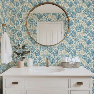 Elegant bathroom with Blue Coral Reef coastal wallpaper featuring hand-drawn coral branches, enhancing the beach-inspired decor.