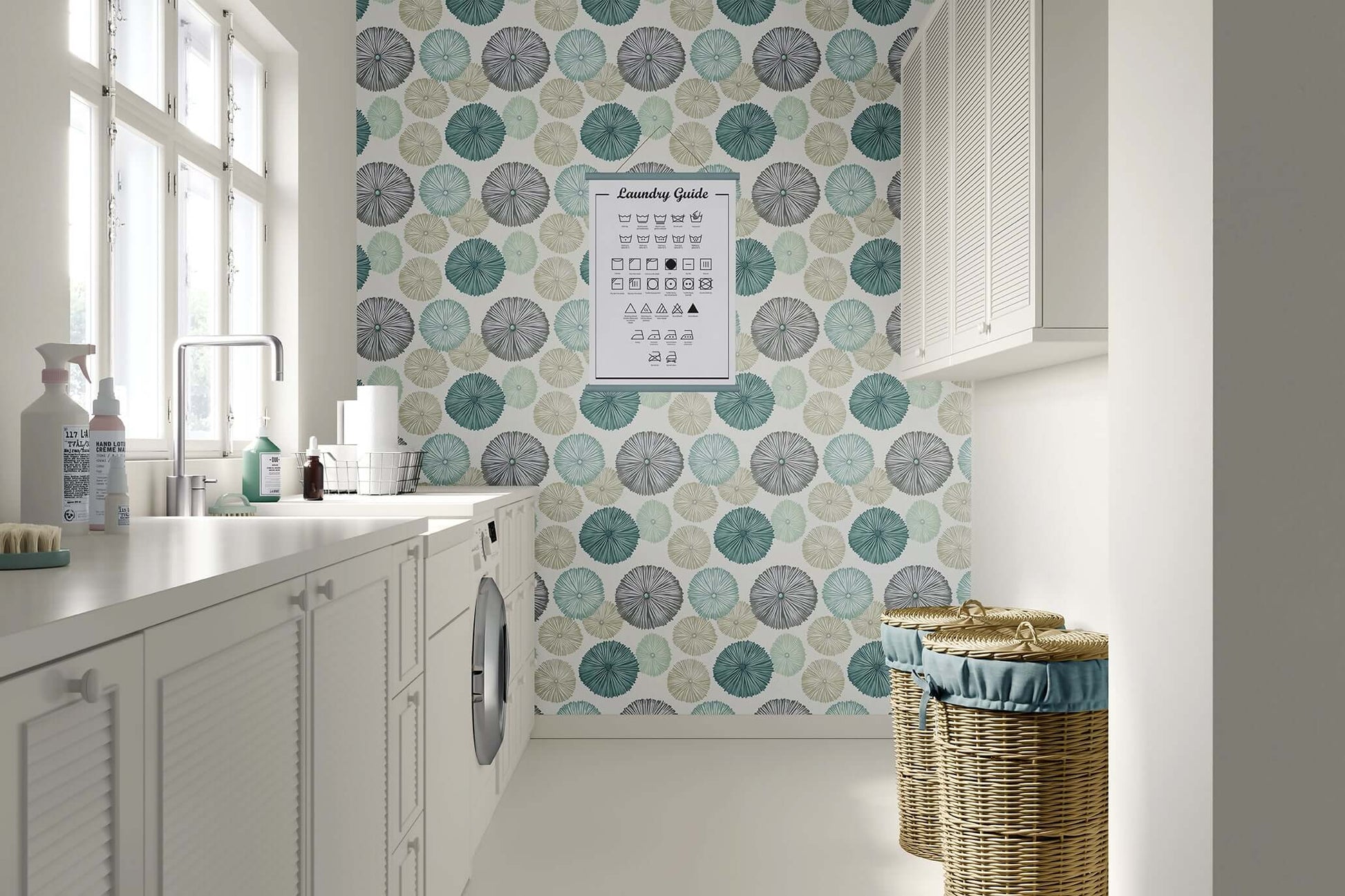 Modern sea urchins wallpaper in teal, sage, and gray accents a contemporary laundry room, showcasing coastal and beach design elements.