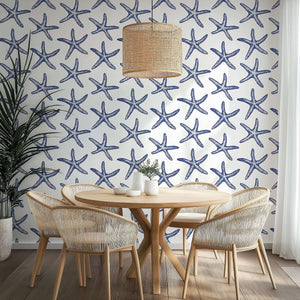 Modern coastal wallpaper with blue starfish pattern, perfect for beach-themed rooms. Enhance your space with seaside charm.