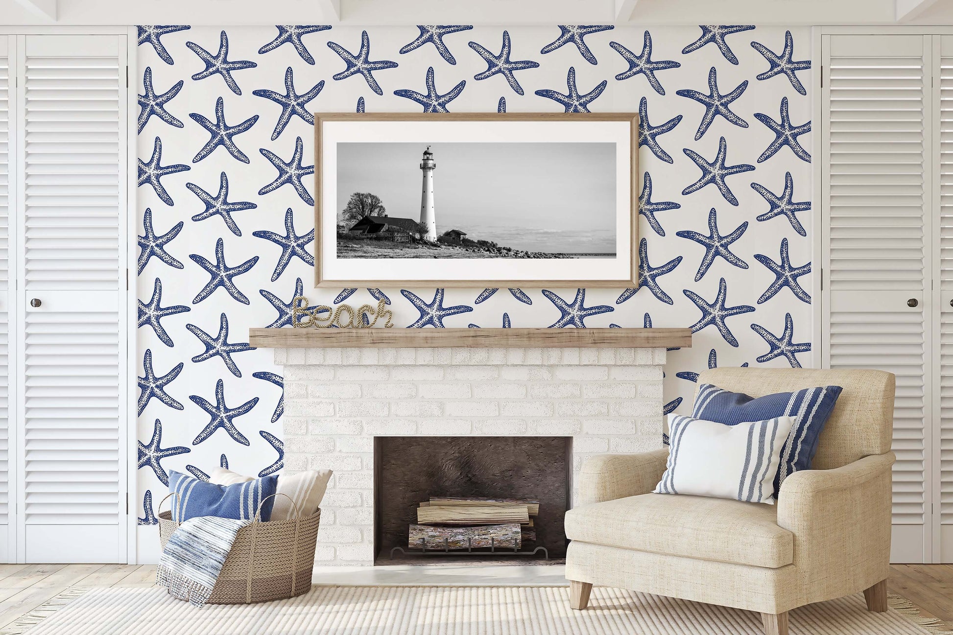 Coastal living room with Seaside Stars wallpaper, featuring blue starfish on white, for a modern beach-inspired design.