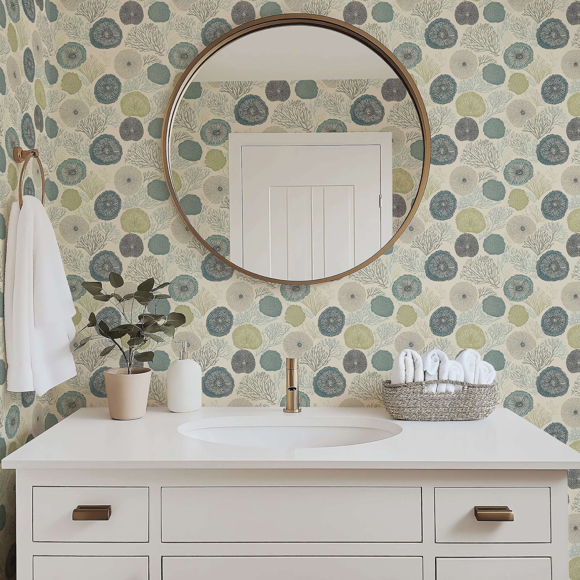 Elegant bathroom with Seabed Chic wallpaper featuring coral and sea urchin design in blue, green, taupe for modern coastal style.