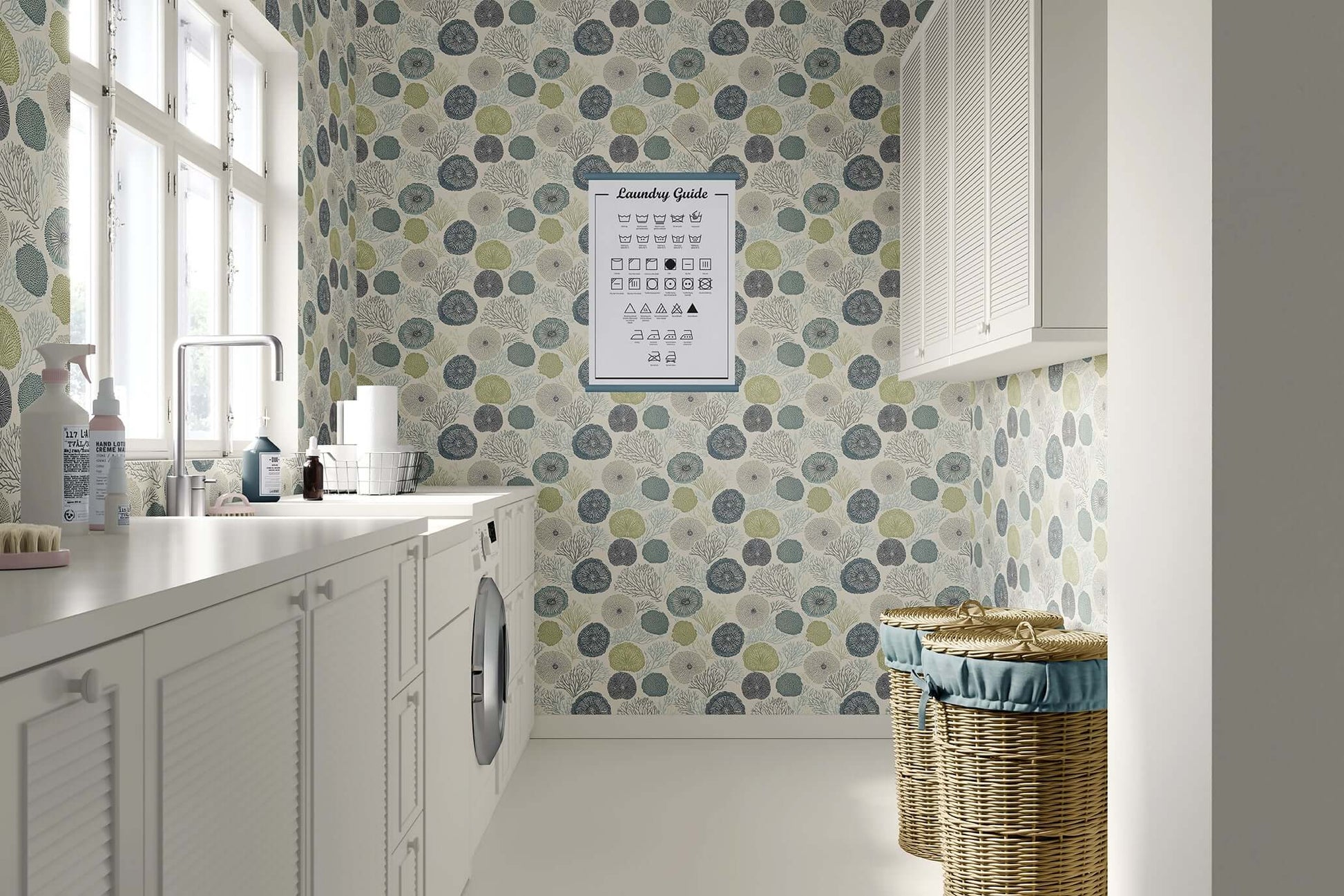 Seabed Chic coastal wallpaper featuring coral and sea urchin designs, adding modern elegance to a bright laundry room.