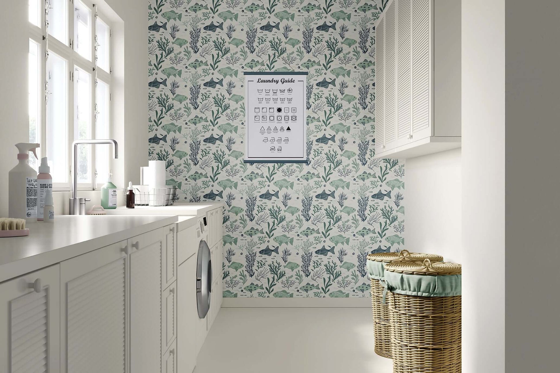  Coastal wallpaper with playful fish and seaweed in a laundry room, featuring mid-century modern ocean design.