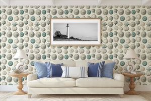 Elegant living room with Ocean Gems wallpaper featuring seashells, enhancing modern coastal design and beach-inspired decor.