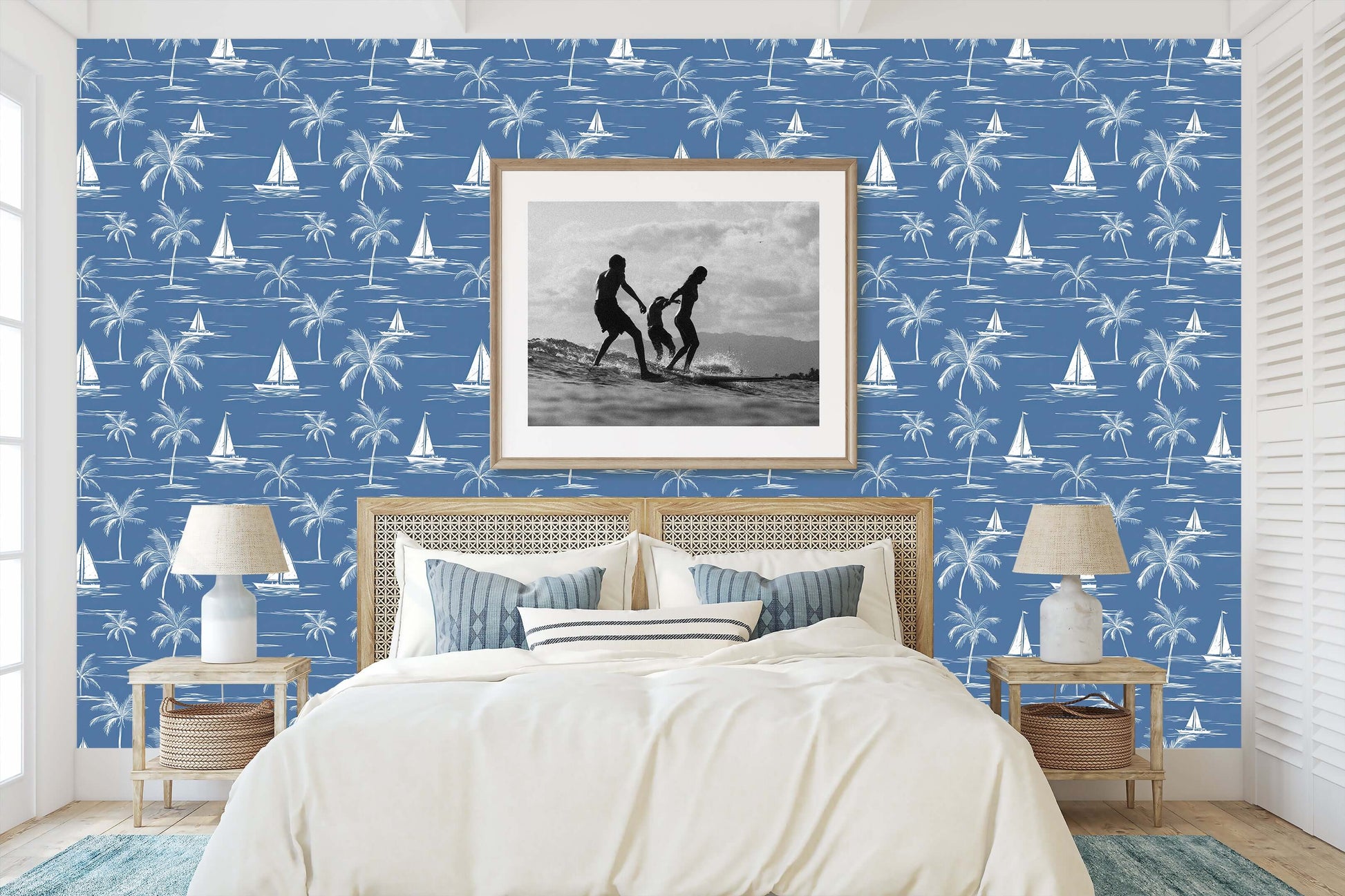 Coastal bedroom with Sail and Palm wallpaper featuring toile design of sailboats and palm trees on a blue backdrop, ideal for beach decor.