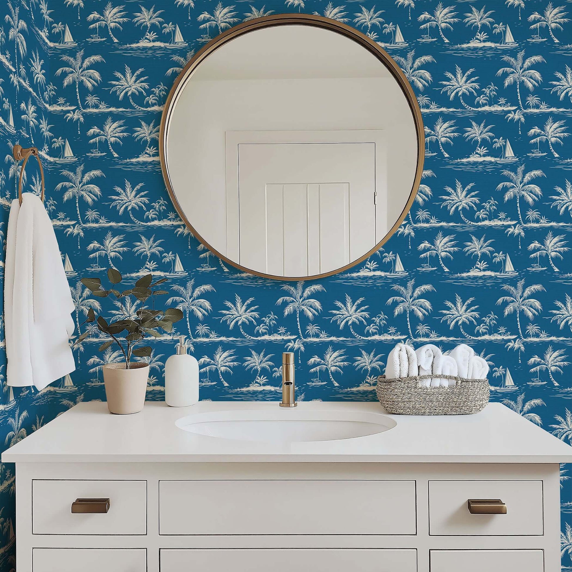 Bathroom featuring 'Blue Hawaii' coastal wallpaper with palm trees and sailboats, creating an elegant beach-inspired toile ambiance.