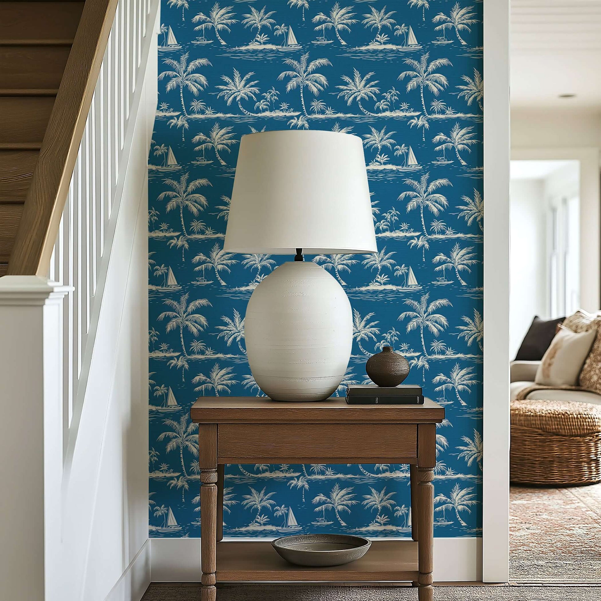 "Blue Hawaii" coastal wallpaper with hand-drawn palm trees and boats in French toile style, creating a tropical beach atmosphere.