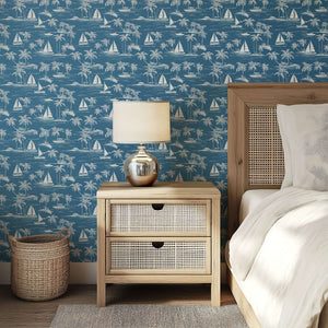 Sail Away wallpaper with sketch sailboats, palm trees on blue background, coastal toile design for beach-themed decor.
