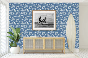 Sail Away Wallpaper featuring coastal design with sketch sailboats, palm trees, and a serene blue background perfect for nautical decor.