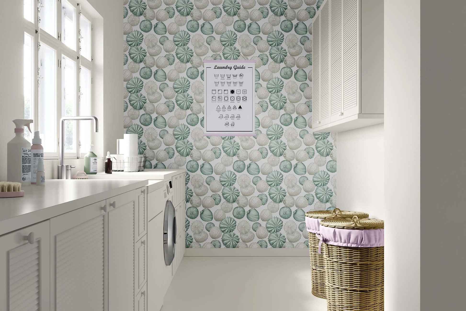 Bright laundry room featuring "Ocean Jewels" wallpaper with sea urchins and seashells in soft green, cream, and blue tones for a coastal vibe.