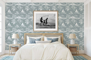 Lagoon Tranquility wallpaper featuring palm trees and sailboats, adding coastal elegance to bedroom decor with boating and ocean vibes.
