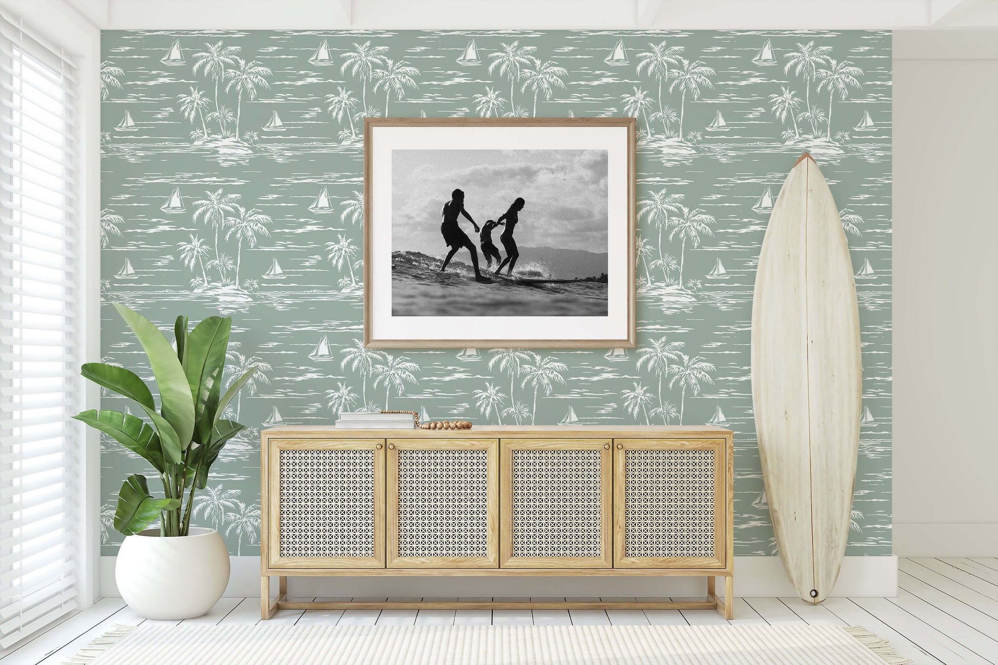 Palm Coastline wallpaper with palm trees and boats in a coastal-themed room, featuring a surfboard and framed photo, enhancing oceanic vibes.