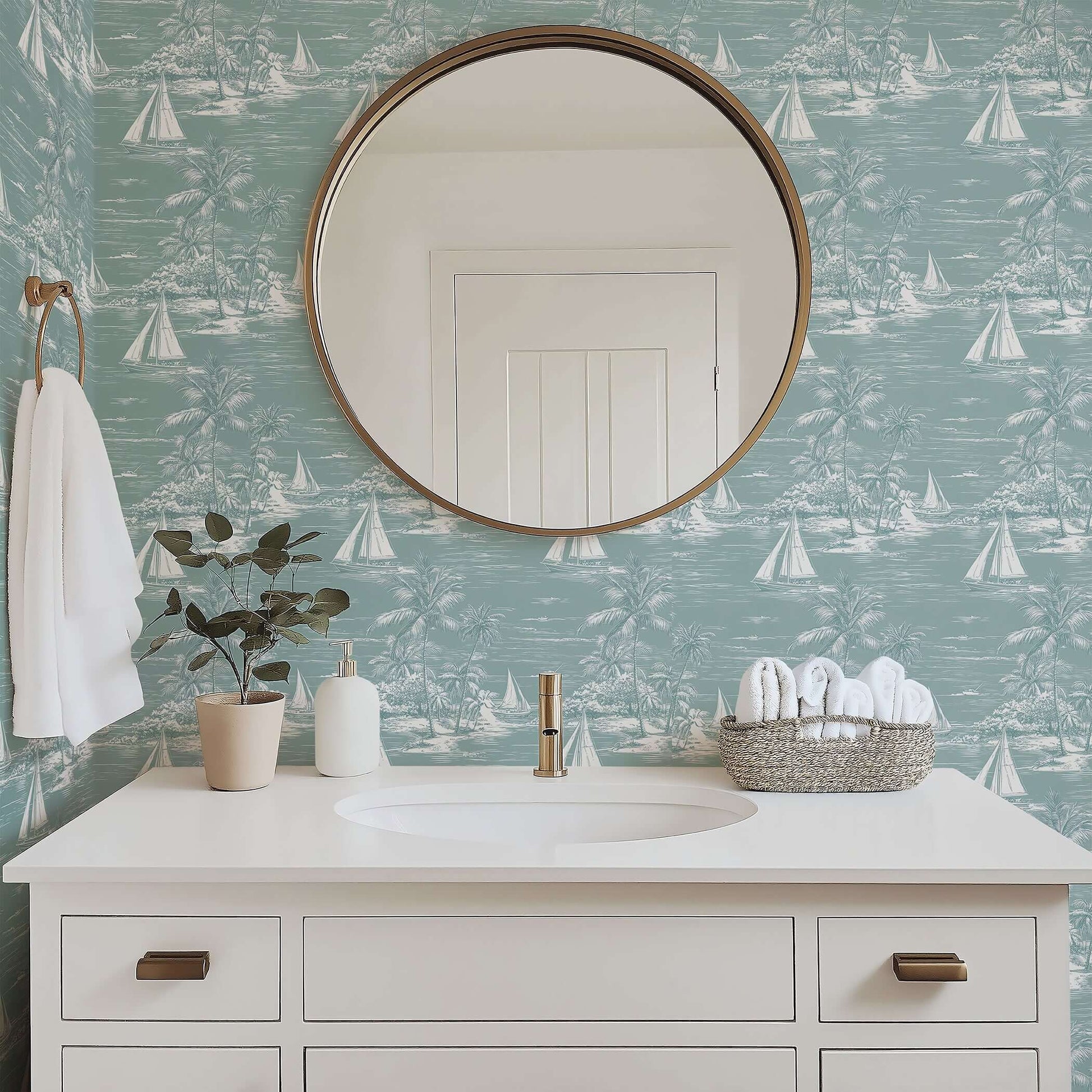 Bathroom with 'Lagoon Views' coastal wallpaper featuring sailboats and palm trees, enhancing a serene seaside aesthetic with ocean charm.