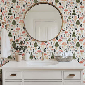 Whimsical woodland wallpaper with hand-drawn toadstools and trees in blush and green, perfect for nurseries and playrooms.