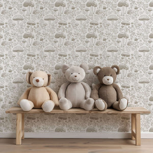 Three plush toys on a bench against Enchanted Woodland Toile wallpaper featuring intricate forest motifs in a soft monochrome toile design.