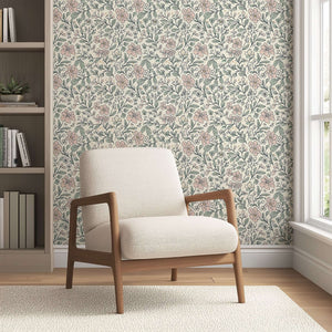Little Blossoms Garden wallpaper with pink floral botanicals and leafy sprigs creates a charming cottagecore atmosphere in a modern room.