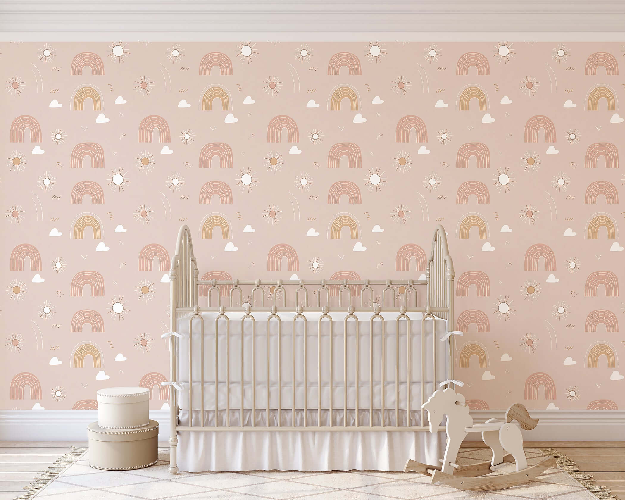Dreamy Rainbows wallpaper featuring hand-drawn rainbows and clouds in pink, ideal for modern baby nursery and playroom decor.