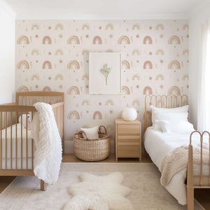 Nursery with Sunshine and Rainbows II Wallpaper featuring pastel rainbows, suns, and foliage on a neutral background. Perfect for modern kids' rooms.