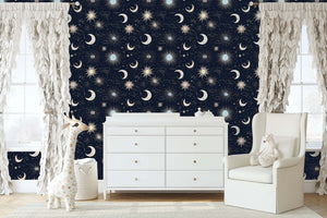 Night Sky Magic Wallpaper in nursery with stars, moons; modern design ideal for children's room or playroom, deep blue cosmic theme.
