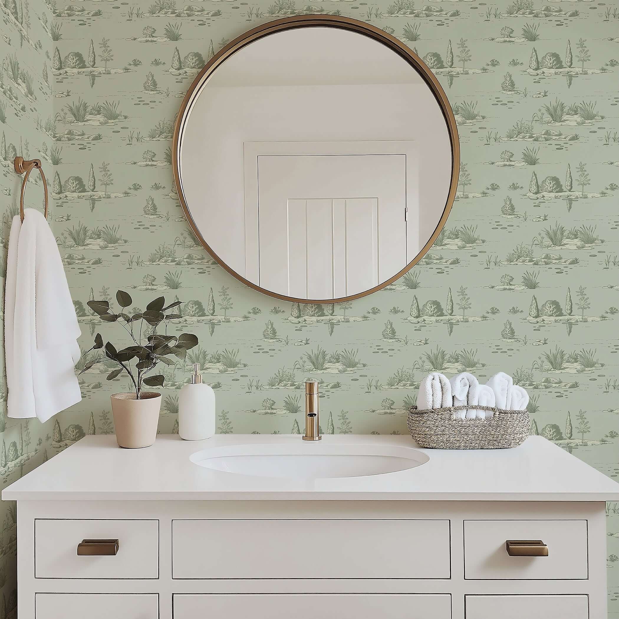Elegant bathroom with sage green French toile wallpaper depicting nature landscape reflections, enhancing tranquility and style.